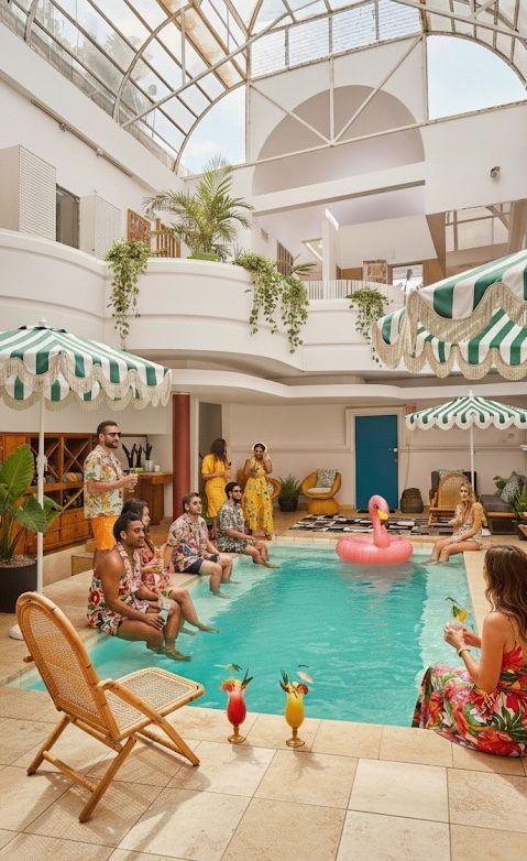 The Graeber atrium with pool and umbrellas